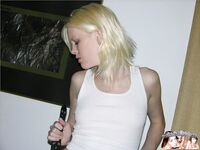 Blonde amateur in shit kicker boots tales of hr clothes to pose nude on sofa