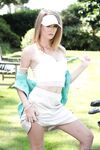 Horny wife Ashley Lane flaunts her cute titties on the golf course
