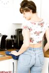Over 30 lady Kate Anne uncovers big naturals and shaved pussy in the kitchen