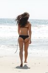 American damsel Tiffany Drake teasing in sexy bikinis on the beach