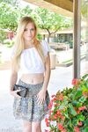 Cute teen takes off her clothes and goes for a naked walk down the road