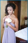 Adorable ebony Penny Flame exposes her nice body and takes white cock on a bed