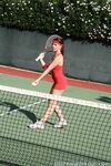 Curvy brunette Penny Flame flaunts hot ass & deep cleavage in her tennis dress