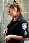Female prison guard gets caught rubbing her tits on a man by fellow officer