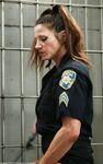 Naughty policewoman Kym Wilde has an FFM BDSM session with inmates