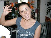 Petite pornstar Penny Flame flashes natural tits & pussy while changing