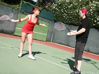 Sexy Penny Flame entices with ass & cleavage in tight dress on a tennis court