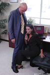 Penny Flame with huge hooters riding a massive cock in the office
