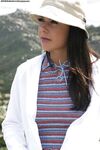 Skinny dark haired milf Penny Flame is posing outdoor in mountains