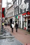 Visiting sex tourist pick up a couple of hookers from the red light district