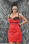 Busty MILF Ava Addams gets rid of her red dress and bra to pose in panties