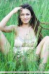 European glamour model Sofi A revealing perfect breasts in country field