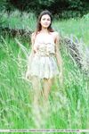European glamour model Sofi A revealing perfect breasts in country field