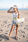 Sexy teen with tattoos Liya Silver gets fucked on a bed & poses on the beach