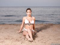 Sexy teen with tattoos Liya Silver gets fucked on a bed & poses on the beach