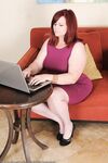 Pretty fatty mature Marcy Diamond boldly strips to display spread bald beaver