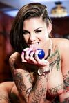 Big titted tattooed Bonnie Rotten strips leather to pose naked on pool table