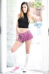 Jaye Summers in knee socks flashes panty upskirt before undressing outdoors