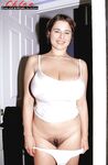 Busty MILF Chloe Vevrier revealing hairy pussy and sexy barefeet