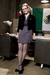 Nerdy pornstar Penny Pax shows her natural tits and poses in sheer pantyhose