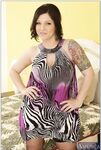 Chubby MILF Claire Dames exposes her sensational breasts and big bum in a solo