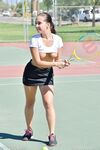 Teen tennis player inserts her racquet handle into her horny twat
