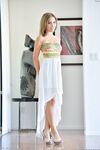 Skinny flat chested girl in long dress spreads for nude pussy upskirt