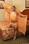 Pretty Indian babe Dipti strips off her sari and shows off her boobs and pussy