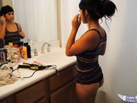Cute brunette Layla Rose strips to reveal big tits & firm ass in the bathroom