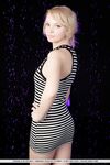 Smiley faced teen Feeona A revealing toned body parts in the nude