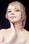 Smiley faced teen Feeona A revealing toned body parts in the nude