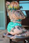 Inked BBW with rainbow hair Galda Lou exposes her huge melons and big butt