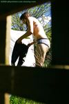 Hidden voyeur spies on naked girl getting dressed outdoors
