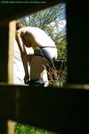 Hidden voyeur spies on naked girl getting dressed outdoors