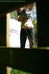 Hidden voyeur spies on naked girl getting dressed outdoors