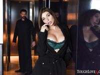 Brunette chick covers up her naked boobs in front of a Priest