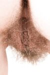 Teen first timer Mary K finger spreads her natural pussy during a nude closeup