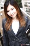 Attractive Japanese MILF Yuria Kanno posing in public in her sexy uniform