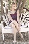 Teen first timer Lena Anderson vaunts her lithe body under a tree outside