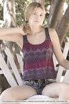 Teen first timer Lena Anderson vaunts her lithe body under a tree outside