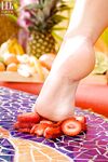 Sugary babe with beautiful legs Lily Love shows off in a hot foot fetish scene