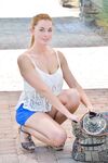 Adorable amateur babe Bailee strips in public and fingers her asshole indoors