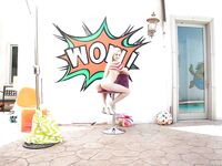 Teen pornstar Elsa Jean displaying folded back labia lips after doffing shorts