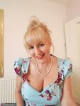 Classy mature Lorna Blu hiking dress to spread pussy lips & pinching nipples