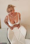 Classy mature Lorna Blu hiking dress to spread pussy lips & pinching nipples