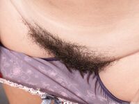 Tall female Gadget uncups her big naturals before spreading her trimmed muff