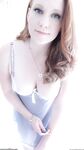 Redhead Lucy OHara hits the spot with her dildo for an arousing orgasm