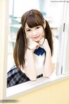 Cutie Japanese schoolgirl in pigtails shows naked ass in no panties upskirt