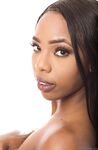 Petite black girl rocks her phat ass as she peels off her bra and panty set