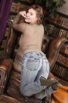 Hot babe Lottii Rose reveals her nice juggs and poses topless in green nylons